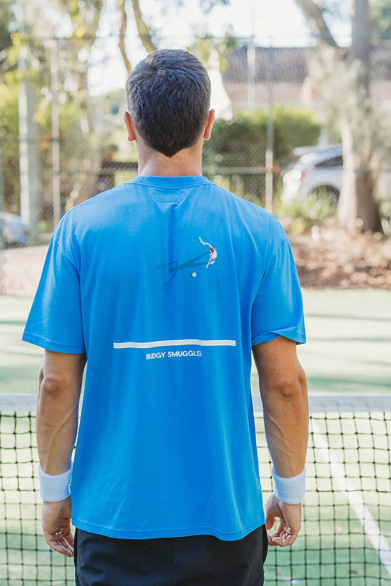 Lightweight Blue Tee in Tennis Court - Image 3