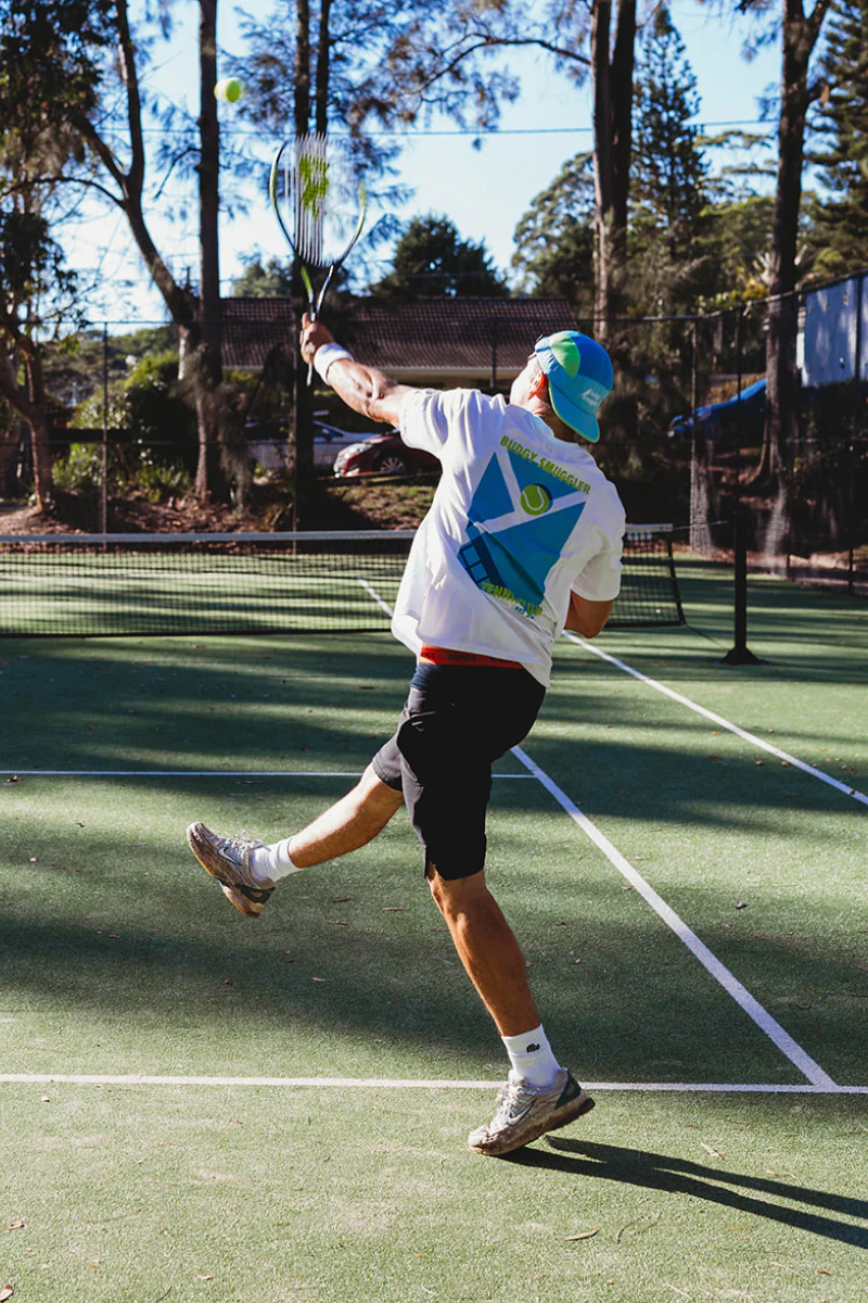 Lightweight White Tee in Tennis Court - Image 4